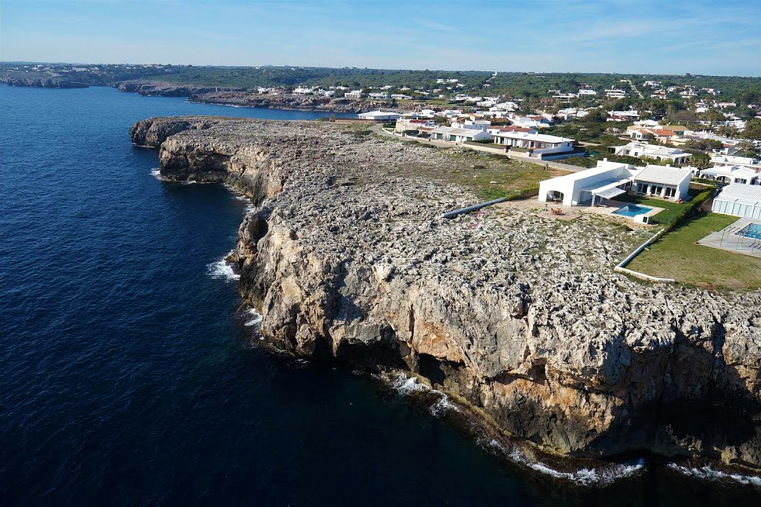Menorca: house for sale bordering the sea